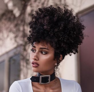 natural hair high puff with bangs