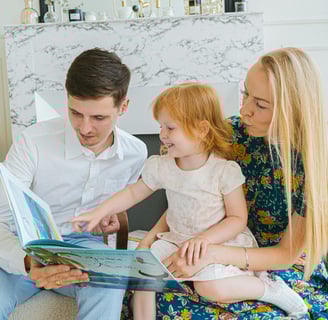 A parent and child sitting together, having an open and honest conversation in a calm and supportive