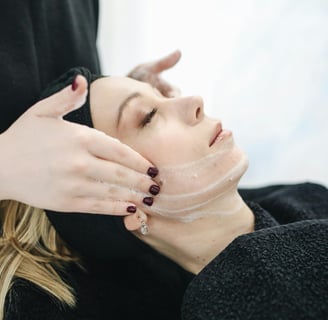 A woman applying natural honey and lemon face mask, promoting clear skin with DIY skincare solution