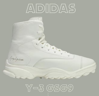 a pair of white adidas sneakers with the words adidas GSG9