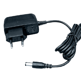 a black and white photo of a power supply plugged in a plugged in