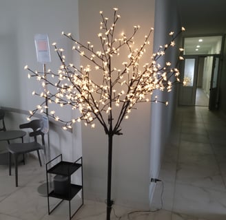 a tree with white lights on it