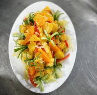 a plate of food with a salad on it