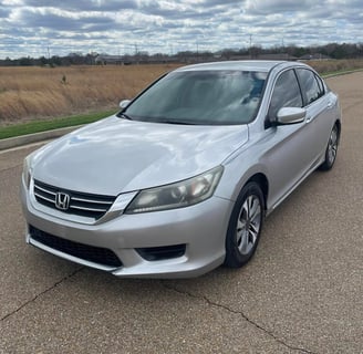 a silver honda accord