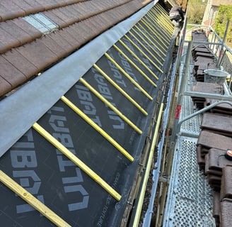 Travaux de couverture générale réalisés par MF Couverture à Puteaux (92) - Pose de sous-toiture et liteaux