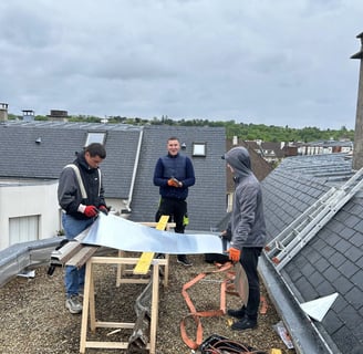 Travaux de zinguerie sur toiture en zinc à Puteaux (92) réalisés par l’équipe MF Couverture