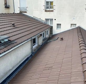 Travaux de couverture réalisés par MF Couverture à Puteaux (92) - Pose de toiture en tuiles et travaux de zinguerie