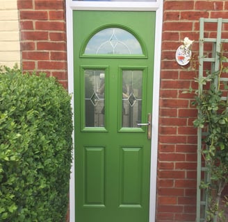 A bespoke green painted composite front door that fits a Victorian terrace house in Hampshire