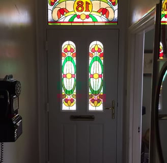 a front door with bespoke glass for a new front door