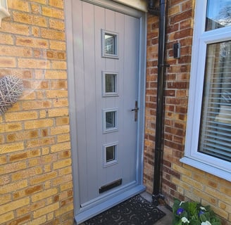 new silver grey front door with 4 panels of glass fitted in chandlers ford by buildmydoor