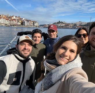 Captain Francisco, owner of Ricky’s Douro, posing for a group photo with happy guests