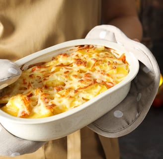 Potatoes au Gratin in a white baking dish