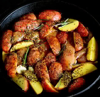 a pan with roasted red potatoes in a skillet