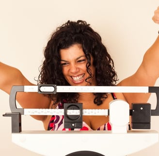 woman on weight scale