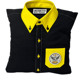 a black shirted pillow with a yellow collar and pocket