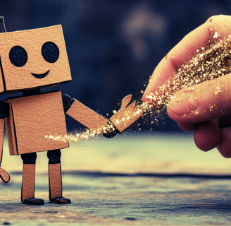 a person holding a small robot toy in front of a person's hand