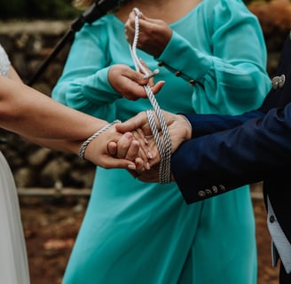 a couple - tie the knot on their special day
