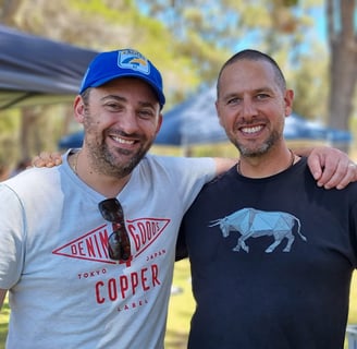 Kamal Alforo with guest at a Paella catering event