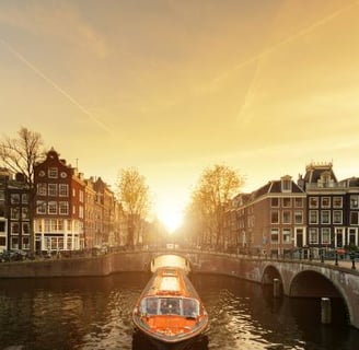 a boat on a river with a bridge in the background