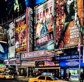 New York - a taxi cab cab driving down a busy street