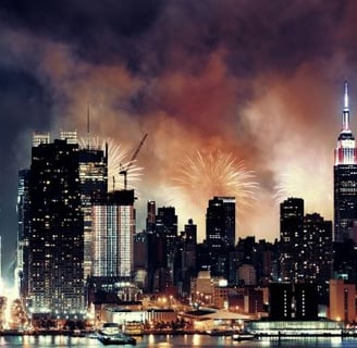 fireworks in the sky over a new york city skyline