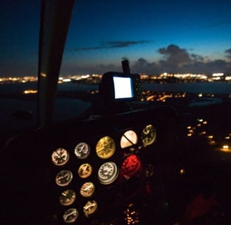 a view of a plane in the night sky