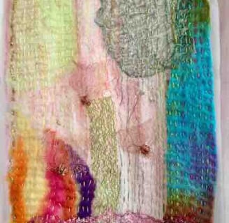 Hand stitched sampler on silk & metal