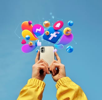 a person holding a cell phone with social media icons