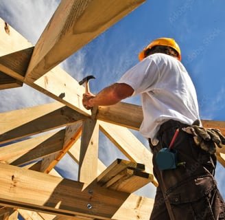 a construction worker is working on a roof truss truss truss truss truss truss truss truss