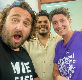 About us page shows a fun image of tattoo artist Raja Natraj in the tattoo studio with his clients.