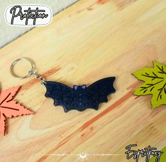Chauve souris noire et violette