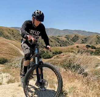 a mtb rider thinking about the jump they are about to hit