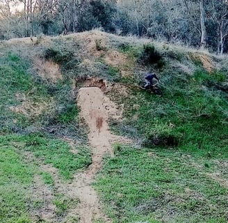 landing a hip jump on a mountain bike