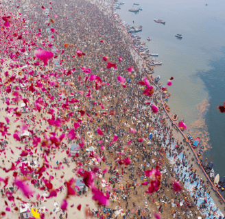 Flower petals being showered on tourists at Maha Kumbh at Prayagraj