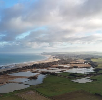 a view of a beach with a view of the ocean