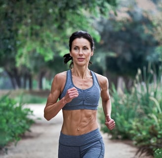 a woman in a sports bra top running