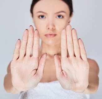 a woman with her hands up and her hands up