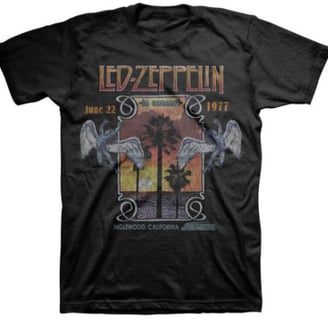 a black and white t - shirt with a picture of a man in a black