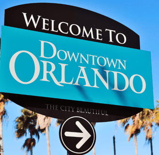 a sign that says downtown orlando