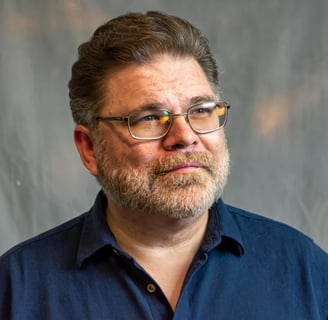 a high-resolution headshot of Justin Deane Hoke