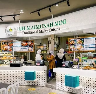 a restaurant with a large display of food and drinks