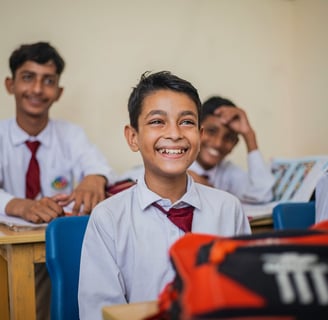 KIDS LEARNING IN OFFLINE CLASS IN A CHEERFUL MOOD