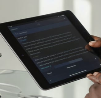 “Ipad screen showing a glowing PDF icon labeled ‘150 AI Prompts’ while creative ideas (light-bulb 