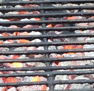 grill with hot coals underneath