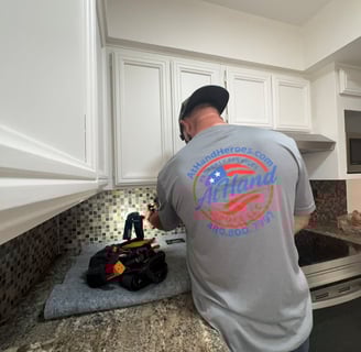 Handyman working on electrical outlet