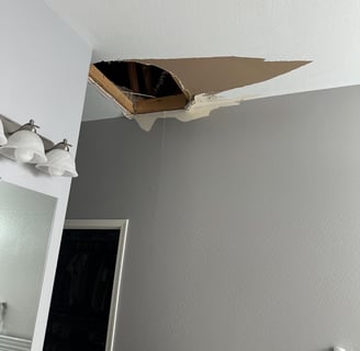Hole in Drywall Ceiling of a home in Surprise. AZ At Hand Heroes Handyman to fix