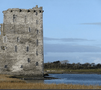 a castle with a tower in the middle of it