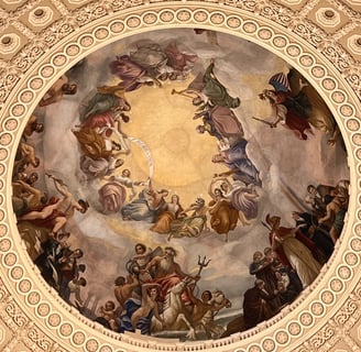 a dome of a building with a painting of a painting on it