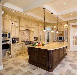 Luxury kitchen remodel in Buckeye AZ featuring white quartz island and pendant lighting