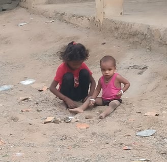 Children is playing with sand
